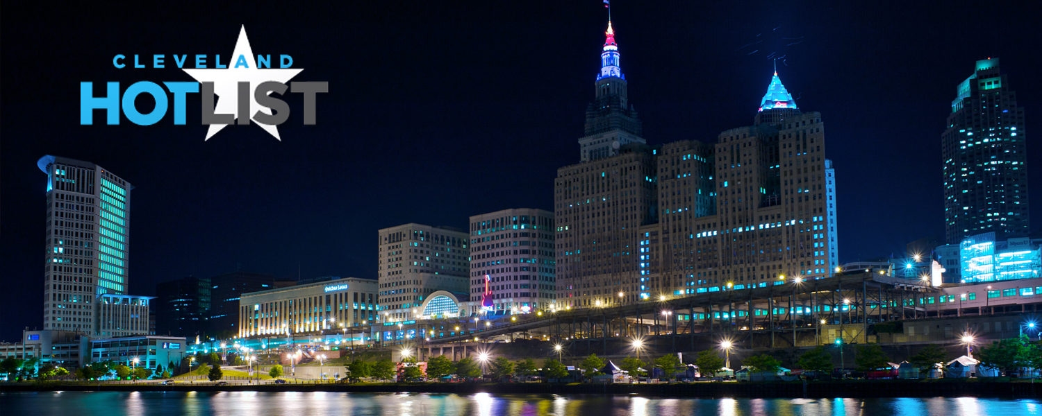 Cleveland skyline at night with the Cleveland Hot List logo